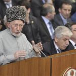 Said Atsayev (L), a leading Sufi Muslim cleric in the mostly Muslim region, addresses the audience during the Dagestan Peoples Congress in Makhachkala in this December 15, 2010 file photo. A female suicide bomber killed an Islamic spiritual leader and at least five other people on August 28, 2012, in the Dagestan region in Russia's North Caucasus, a police source said. Said Atsayev, a leading Sufi Muslim cleric in the mostly Muslim region, was killed along with five followers and the bomber at his home in the village of Chirkey, the source said. REUTERS/Sergei Rasulov/NewsTeam/Handout/Files (RUSSIA - Tags: CRIME LAW RELIGION) THIS IMAGE HAS BEEN SUPPLIED BY A THIRD PARTY. IT IS DISTRIBUTED, EXACTLY AS RECEIVED BY REUTERS, AS A SERVICE TO CLIENTS. FOR EDITORIAL USE ONLY. NOT FOR SALE FOR MARKETING OR ADVERTISING CAMPAIGNS
