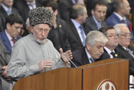 Said Atsayev, a leading Sufi Muslim cleric in the mostly Muslim region, addresses the audience during the Dagestan Peoples Congress in Makhachkala Said Atsayev (L), a leading Sufi Muslim cleric in the mostly Muslim region, addresses the audience during the Dagestan Peoples Congress in Makhachkala in this December 15, 2010 file photo. A female suicide bomber killed an Islamic spiritual leader and at least five other people on August 28, 2012, in the Dagestan region in Russia's North Caucasus, a police source said. Said Atsayev, a leading Sufi Muslim cleric in the mostly Muslim region, was killed along with five followers and the bomber at his home in the village of Chirkey, the source said. REUTERS/Sergei Rasulov/NewsTeam/Handout/Files (RUSSIA - Tags: CRIME LAW RELIGION) THIS IMAGE HAS BEEN SUPPLIED BY A THIRD PARTY. IT IS DISTRIBUTED, EXACTLY AS RECEIVED BY REUTERS, AS A SERVICE TO CLIENTS. FOR EDITORIAL USE ONLY. NOT FOR SALE FOR MARKETING OR ADVERTISING CAMPAIGNS