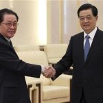 China's President Hu Jintao (R) shakes hands with Jang song-thaek, Chief of the Central Administrative Department of the Workers' Party of Korea, in Beijing, August 17, 2012. REUTERS/China Daily