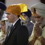 Wisconsin Governor Scott Walker attends a prayer service at the Sikh Temple in Brookfield, Wisconsin August 6, 2012. REUTERS/John Gress