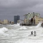 Waves crash against Havana's seafront boulevard 'El Malecon' August 26, 2012. REUTERS/Desmond Boylan