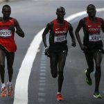 Uganda's Stephen Kiprotich and Kenya's Wilson Kipsang Kiprotich and Abel Kirui( L-R) compete during the men's marathon in the London 2012 Olympic Games at The Mall August 12, 2012. REUTERS/Mark Blinch