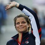 Kim Clijsters of Belgium waves to the gallery after her loss to Laura Robson of Britain in their women's singles match at the U.S. Open tennis tournament in New York August 29, 2012. The star-studded career of Clijsters ended in the place where it all began on Wednesday, just not quite in the way she would have wanted. The popular Belgian, who won as many friends for her bubbly, generous character as for her 'eyeballs-out' tennis and fighting spirit, saw her hopes of a fairytale goodbye dashed by British teenager Robson in the second round of the U.S. Open. REUTERS/Jessica Rinaldi