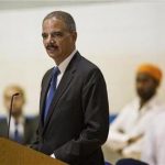 United States Attorney General Eric Holder speaks during the wake and visitation service for victims of last Sunday's attack at a Sikh temple, in Oak Creek, Wisconsin August 10, 2012. REUTERS/Tom Lynn
