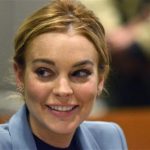 Actress Lindsay Lohan smiles during a progress report hearing in her DUI case at Airport Branch Courthouse in Los Angeles, California, in this March 29, 2012 file photo. Lohan is being sought for questioning by Los Angeles police over a jewelry theft at the home of a friend, the Los Angeles Times reported on August 28, 2012, citing unnamed law enforcement sources. REUTERS/Joe Klamar/Pool/Files