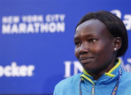 Marathon runner Mary Keitany from Kenya smiles during a news conference for the New York City Marathon, in New York November 4, 2010. REUTERS/Shannon Stapleton