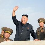 North Korean leader Kim Jong-Un (C) waves as he visits military units on islands in the most southwest of Pyongyang in this picture released by the North's official KCNA news agency in Pyongyang August 19, 2012. REUTERS/KCNA