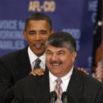 President Barack Obama (L) stands behind AFL-CIO President Richard Trumka before he speaks at the AFL-CIO Executive Council meeting at the Washington Convention Center in Washington, August 4, 2010. REUTERS/Larry Downing