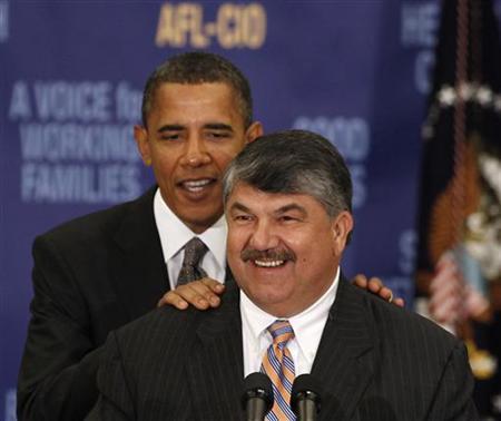 U.S. President Obama stands behind AFL-CIO President Trumka before he speaks at the AFL-CIO Executive Council meeting in Washington President Barack Obama (L) stands behind AFL-CIO President Richard Trumka before he speaks at the AFL-CIO Executive Council meeting at the Washington Convention Center in Washington, August 4, 2010. REUTERS/Larry Downing