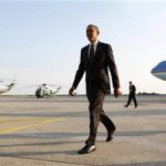 U.S. President Barack Obama walks from Air Force One upon his arrival at Kennedy Airport in New York August 22, 2012. REUTERS/Kevin Lamarque