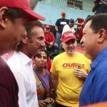 Venezuela's President Hugo Chavez (R) talks to U.S. actor Sean Penn during an election rally in Valencia, some 150 km (93 miles) west from Caracas August 5, 2012. REUTERS/Miraflores Palace/Handout