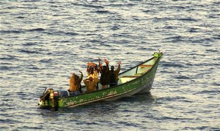 Suspected pirates place their hands above their heads as they are arrested by marines from NATO's Turkish frigate Gediz in the Gulf of Aden Suspected pirates place their hands above their heads as they are arrested by marines from NATO's Turkish frigate Gediz in the Gulf of Aden September 26, 2009. REUTERS/Turkish Chief of Staff/Handout