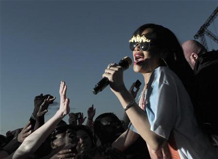 Rihanna goes into the crowd during a performance at the Hackney Weekend festival at Hackney Marshes in east London Rihanna goes into the crowd during a performance at the Hackney Weekend festival at Hackney Marshes in east London, June 24, 2012. REUTERS/Olivia Harris