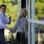 Republican presidential candidate and former Massachusetts Governor Mitt Romney points to his wife Ann as they arrive at Brewster Academy in Wolfeboro, New Hampshire August 27, 2012 to prepare for the Republican National Convention. REUTERS/Brian Snyder