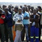 South Africa mine: Lonmin drops threat to fire workers