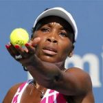 Venus Williams of the U.S. serves to Chanelle Scheepers of South Africa during their second round match in the 2012 Cincinnati Open tennis tournament in Cincinnati, Ohio, August 15, 2012. REUTERS/John Sommers II