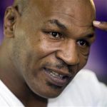 Former undisputed heavyweight boxing champion Mike Tyson points to his head during an interview at the MGM Grand Hotel and Casino in Las Vegas, Nevada March 23, 2012. REUTERS/Steve Marcus