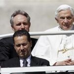 The Pope's butler, Paolo Gabriele (bottom L) arrives with Pope Benedict XVI (R) at St. Peter's Square in Vatican, in this file photo taken May 23, 2012. REUTERS/Alessandro Bianchi/Files
