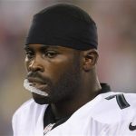 Philadelphia Eagles quarterback Michael Vick is seen shortly before the start of the first quarter of their preseason NFL football game against the New England Patriots in Foxborough, Massachusetts August 20, 2012. REUTERS/Jessica Rinaldi