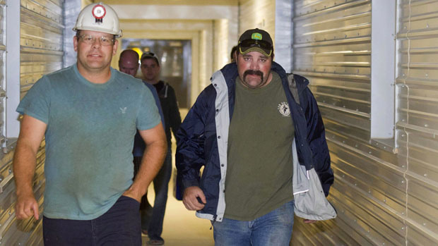 PotashCorp-miners-walk-out-of-the-Rocanville-potash-mine-Tuesday-night-after-being-rescued-from-an-underground-fire