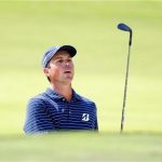 Matt Kuchar of the U.S. looks over the bunker to see where his ball landed on the ninth hole during the second round of the Tour Championship golf tournament at the East Lake Golf Club in Atlanta, Georgia, September 21, 2012. REUTERS/Tami Chappell