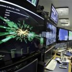 A graphic showing a collision at full power is pictured at the Compact Muon Solenoid (CMS) experience control room of the Large Hadron Collider (LHC) at the European Organisation for Nuclear Research (CERN) in Meyrin, near Geneva March 30, 2010. REUTERS/Denis Balibouse