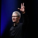 Apple CEO Tim Cook waves at the end of Apple Inc.'s iPhone media event in San Francisco, California September 12, 2012. REUTERS/Beck Diefenbach