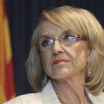 Arizona Governor Jan Brewer listens to a question from a media member about the Supreme Court's decision on SB1070 in Phoenix, Arizona, June 25, 2012. REUTERS/Darryl Webb