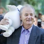 Actor Bill Murray carries a marshmallow doll he received from a fan as he arrives to the gala presentation for the film 'Hyde Park on Hudson' during the 37th Toronto International Film Festival, September 10, 2012. REUTERS/Fred Thornhill