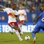 New York Red Bulls Thierry Henry (L) kicks the ball during their MLS soccer match against the Montreal Impact in Montreal, July 28, 2012. REUTERS/Olivier Jean