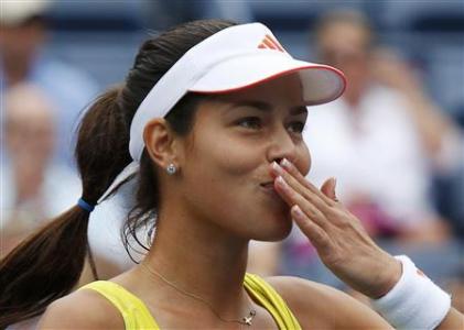 Ana Ivanovic of Serbia blows a kiss after defeating Tsvetana Pironkova of Bulgaria during their women's singles match at the U.S. Open tennis tournament in New York September 3, 2012. REUTERS/Eduardo Munoz