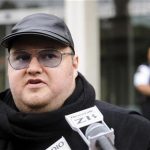Megaupload founder Kim Dotcom talks to members of the media outside the New Zealand Court of Appeals in Wellington September 20, 2012. REUTERS/Mark Coote
