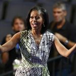 U.S. first lady Michelle Obama gestures as she tours the stage and podium a day before her speech to the Democratic National Convention in Charlotte, Nouth Carolina, September 3, 2012. REUTERS/Chris Keane