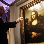 Professor Alessandro Vezzosi, Director of the Museo Ideale Leonardo da Vinci, points to details on a painting attributed to Leonardo da Vinci and representing Mona Lisa during a presentation in Geneva September 27, 2012. REUTERS/Denis Balibouse
