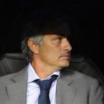 Real Madrid's coach Jose Mourinho takes his seat before the start of their Champions League Group D soccer match against Manchester City at the Santiago Bernabeu stadium in Madrid, September 18, 2012. REUTERS/Felix Ordonez