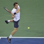 Andy Murray of Britain hits a return to Milos Raonic of Canada during their match at the US Open men's singles tennis tournament in New York, September 3, 2012. REUTERS/Bill Kostroun