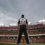 A referee takes his position on the sideline during an NFL preseason football game between the Indianapolis Colts and the Washington Redskins in Landover, Maryland, August 25, 2012. REUTERS/Jonathan Ernst