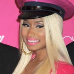 Nicki Minaj Launches 'Pink Friday' Fragrance In Barbie Outfit And PVC Police Hat