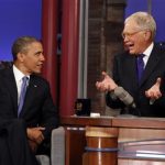Seated with talk show host David Letterman, U.S. President Barack Obama makes an appearance on the "Late Show with David Letterman" at the Ed Sullivan Theater in New York City September 18, 2012. REUTERS/Kevin Lamarque