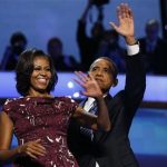 U.S. President Barack Obama celebrates with first lady Michelle Obama and his daughter Malia (L) after accepting the 2012 U.S Democratic presidential nomination during the final session of Democratic National Convention in Charlotte, North Carolina, September 6, 2012. REUTERS/Jim Young