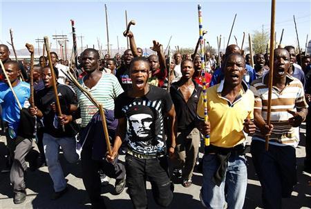 Mine workers take part in a march at Lonmin's Marikana mine in South Africa's North West Province Mine workers take part in a march at Lonmin's Marikana mine in South Africa's North West Province September 10, 2012. REUTERS/Siphiwe Sibeko