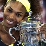 Serena Williams of the U.S. poses with her trophy after defeating Victoria Azarenka of Belarus in their women's singles finals match at the U.S. Open tennis tournament in New York September 9, 2012. REUTERS/Kevin Lamarque