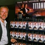 James Cameron, producer, director, and writer of the hit movie Titantic, stands next to a display of Titantic home videos during a press conference, June 8 in Los Angeles, announcing the September 1, 1998 videocassette availability of the Paramount Pictures film.