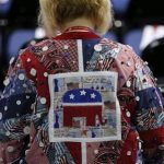 A delegate wearing a quilt shirt walks to her seat before the second session of the Republican National Convention in Tampa, Florida, August 28, 2012 REUTERS/Mike Segar