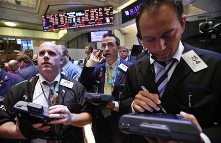 Traders work on the floor of the New York Stock Exchange, September 20, 2012. REUTERS/Brendan McDermid