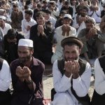 Afghans-offer-Eid-al-Adha-prayers-outside-a-mosque-in-the-outskirt-of-Jalalabad-east-of-Kabul-Afghanistan