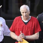 erry-Sandusky-centre-leaves-the-Centre-County-Courthouse-in-Pennsylvania-after-his-sentencing