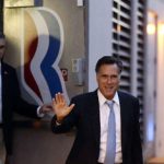 Mitt Romney leaving his campaign headquarters in Boston