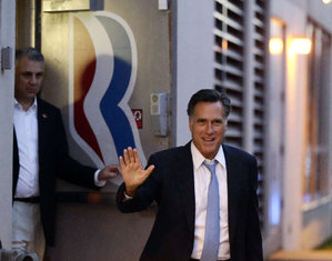 Mitt Romney leaving his campaign headquarters in Boston 