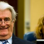 Radovan-Karadzic-smiles-as-he-takes-his-seat-at-the-International-Tribunal-for-the-Former-Yugoslavia-at-The-Hague